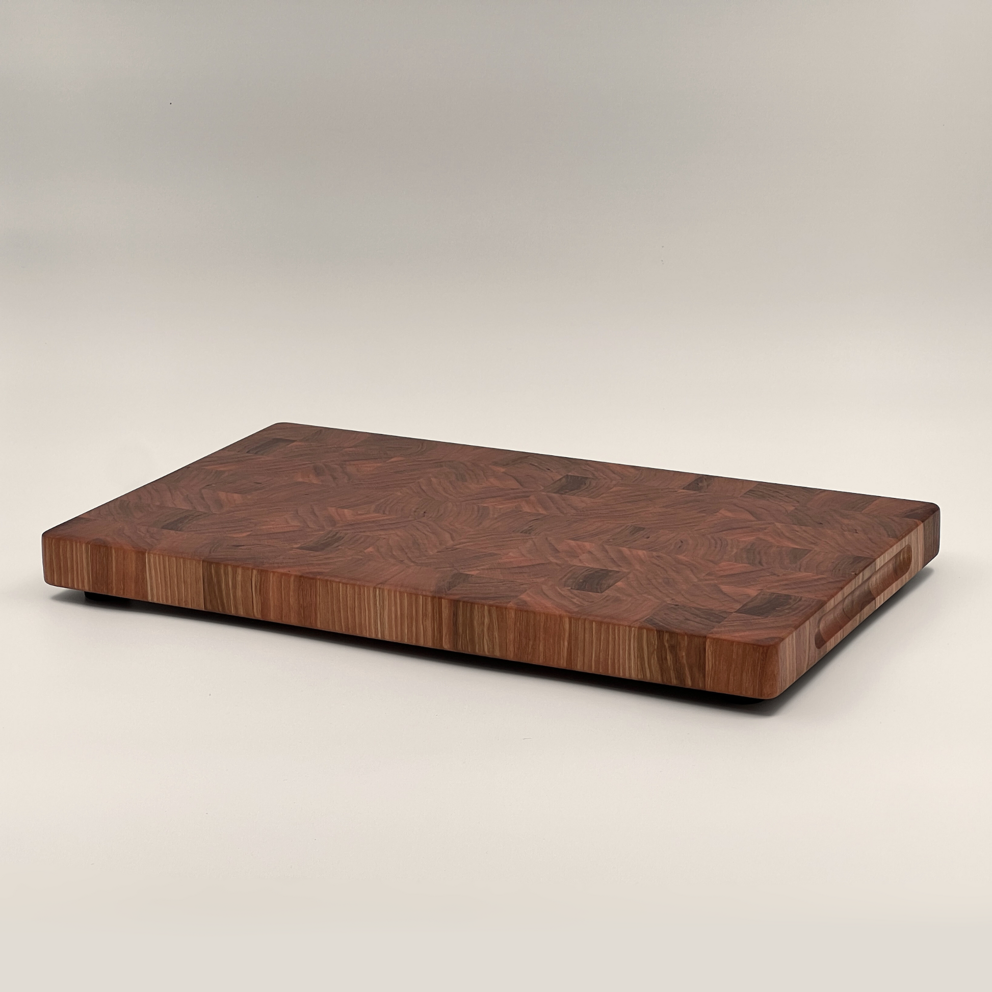 End grain chopping board in Cherry wood