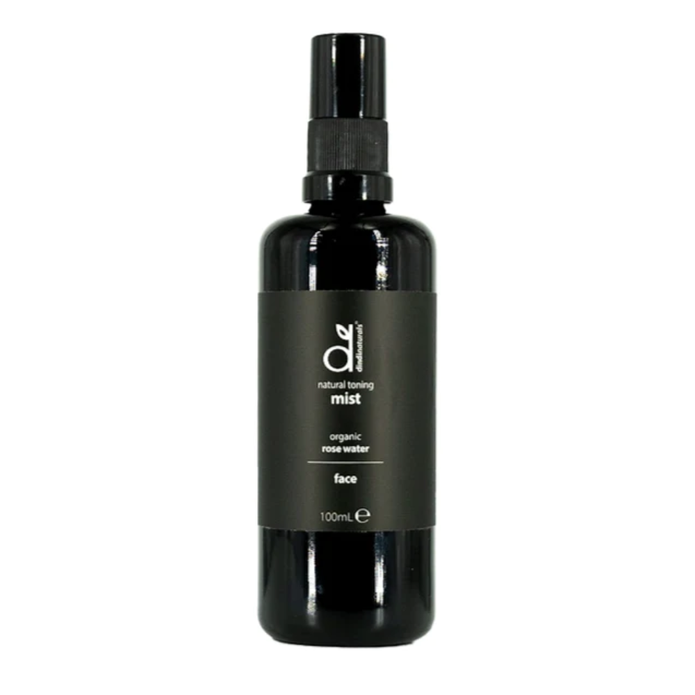 Black bottle of Dindi Naturals organic rose water face mist on a white background