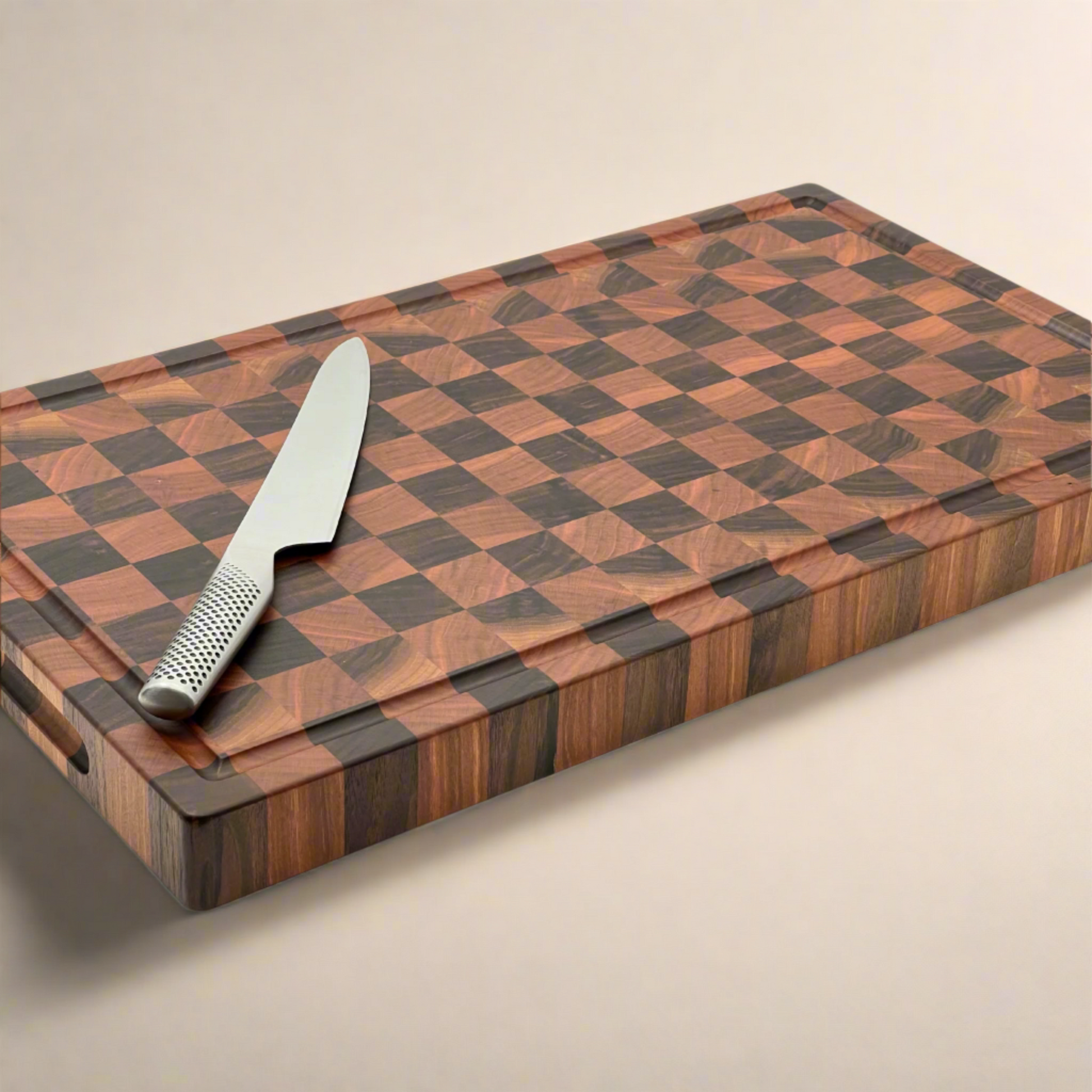 Wooden cutting board with a knife on a beige background