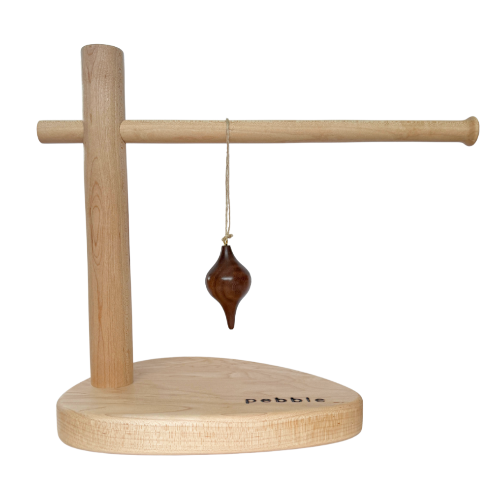 Hand turned Christmas ornament in Walnut wood. Made in Australia and designed for slow living