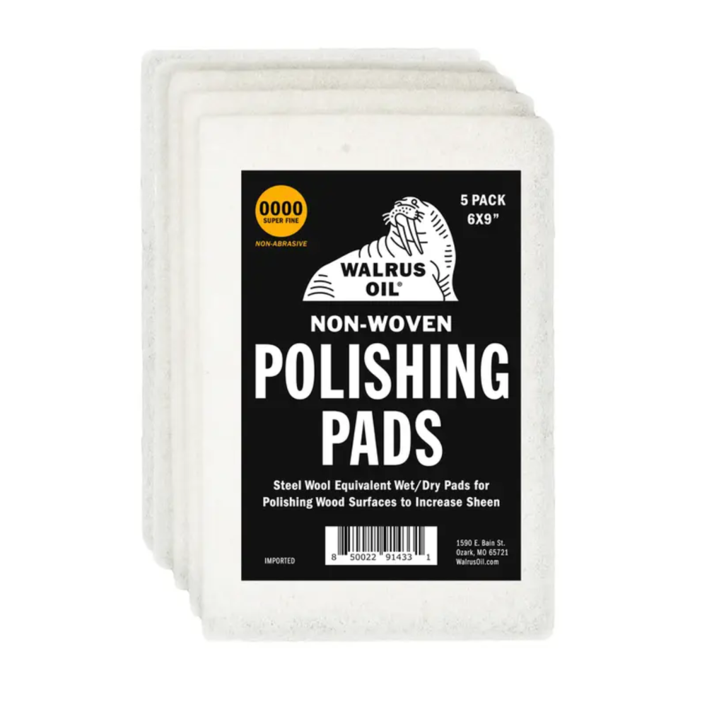 Pack of Walrus Oil non-woven polishing pads on a white background