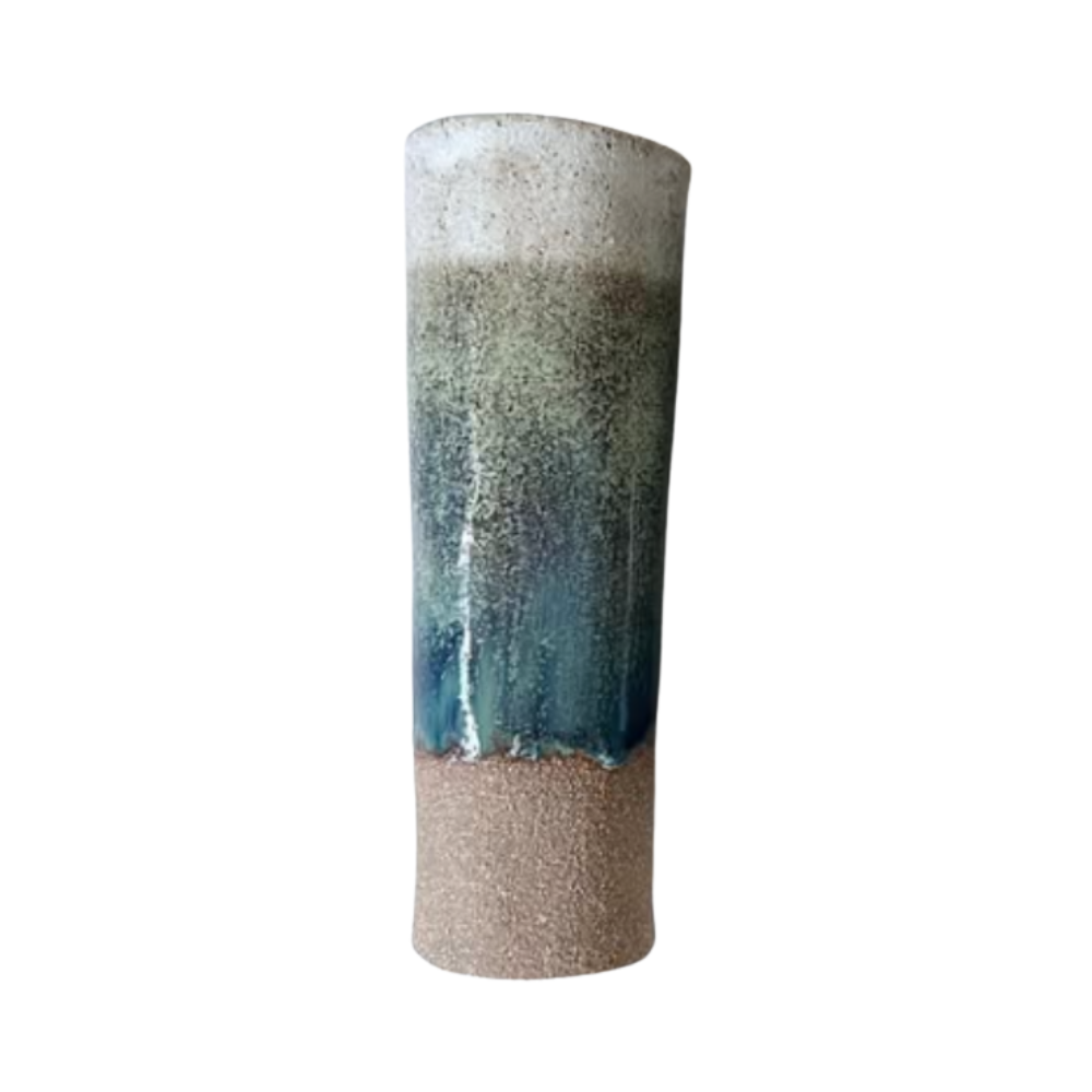 Cylindrical ceramic vase with gradient color from white to blue on a white background