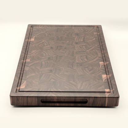 Walnut chopping board shown from the side