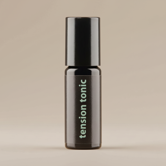 Bottle of 'tension tonic' on a beige background