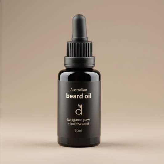 Black beard oil dropper bottle with label on a beige background