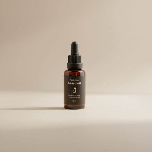 Bottle of Australian beard oil on a beige background