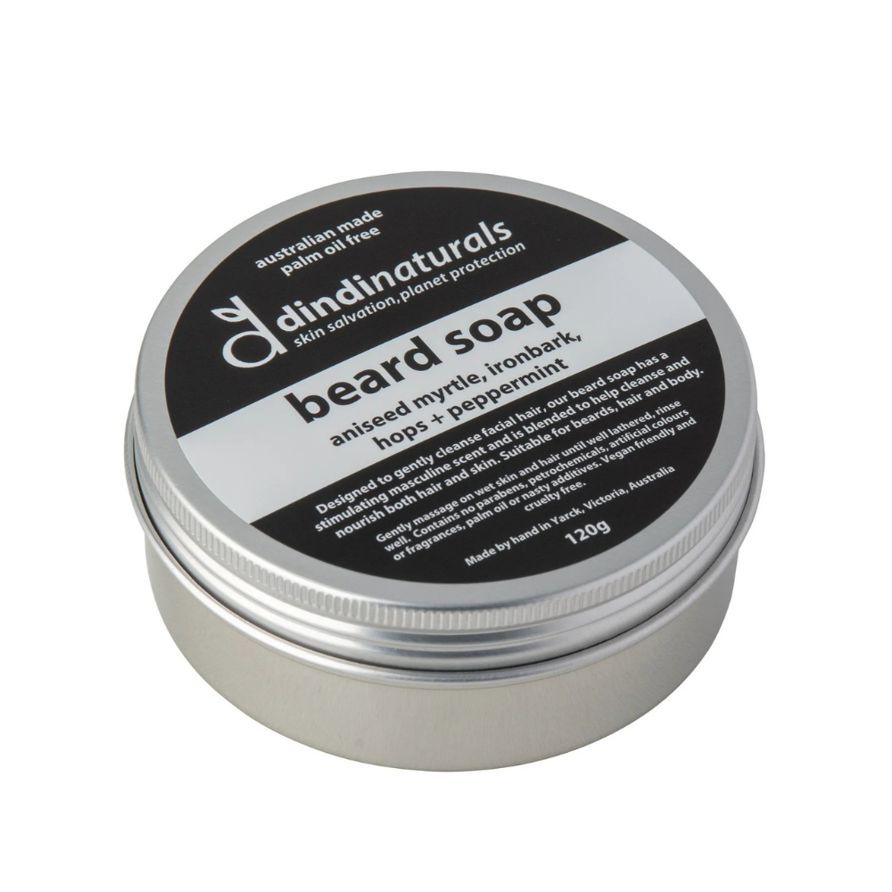Dindi Naturals beard soap in a metal tin on a white background