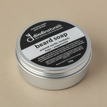 Dindi naturals beard soap container on a beige background