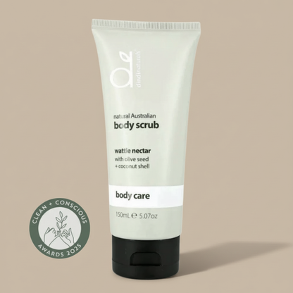 Bottle of body scrub on a light background