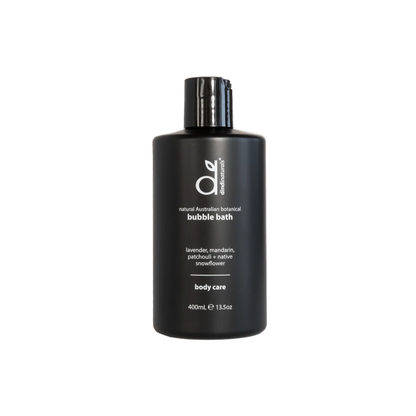 Black bottle of bubble bath with brand logo on a white background