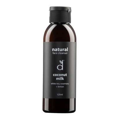 Bottle of Dindi Naturals natural face cleanser with coconut milk ingredients on a white background