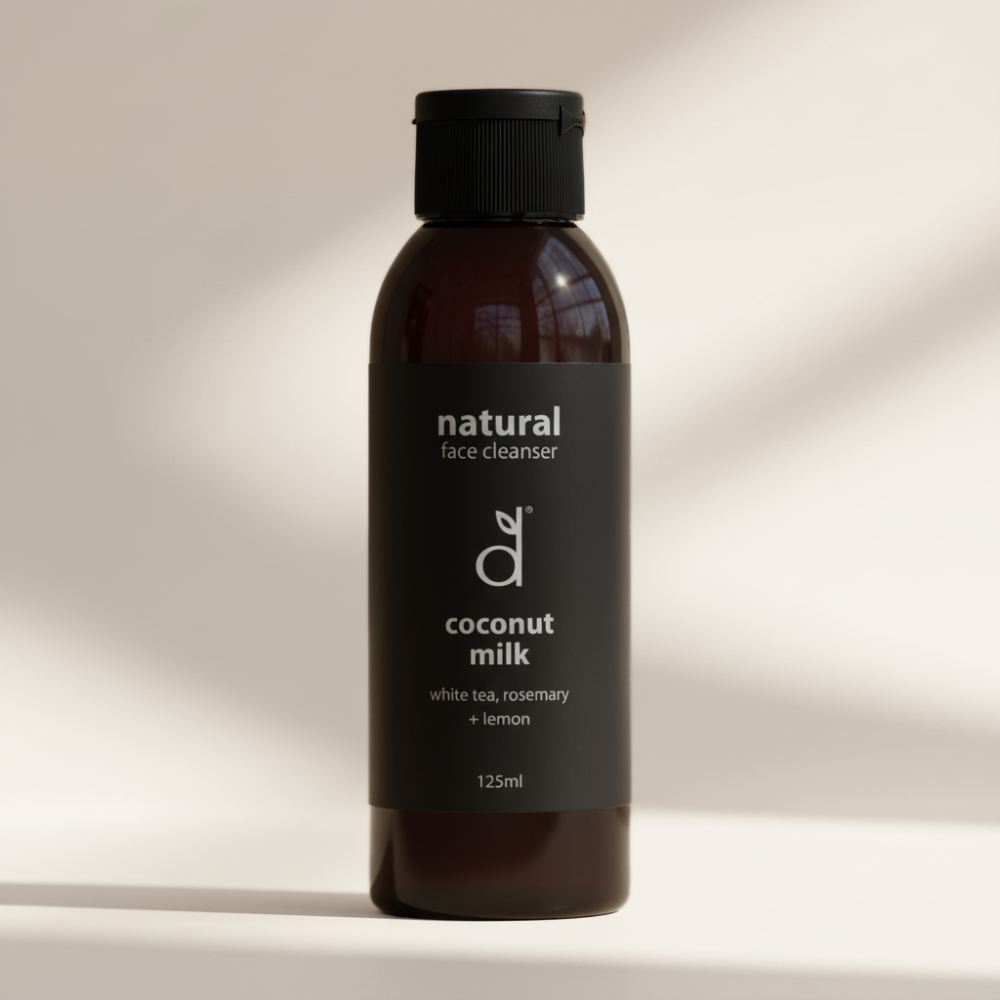 Bottle of Dindi Naturals natural coconut milk face cleanser on a neutral background