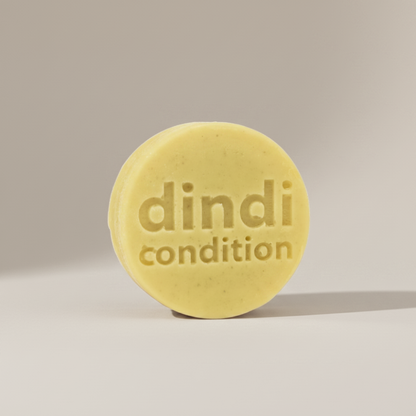 Dindi Naturals Conditioner Bar on a beige background