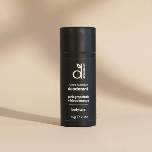 Natural stick deodorant is black packaging on a light background