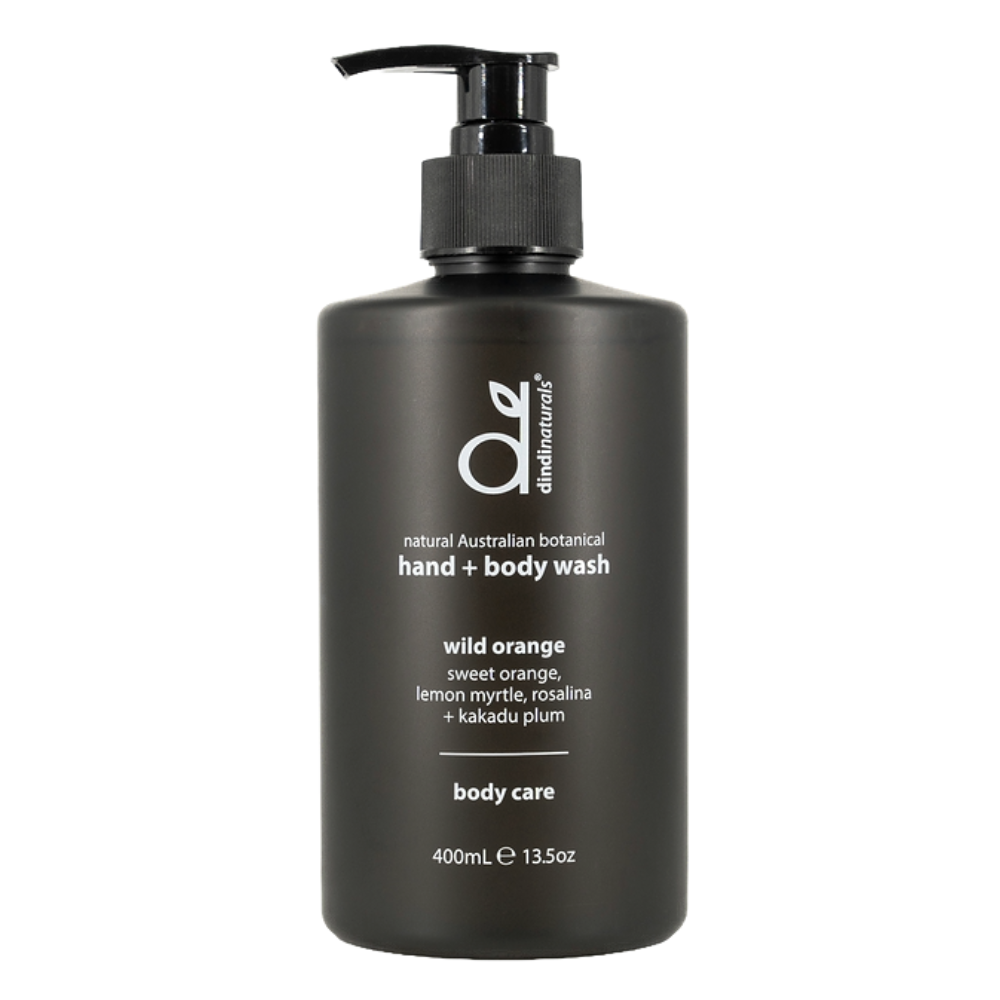 Black bottle of hand and body wash with pump on a white background