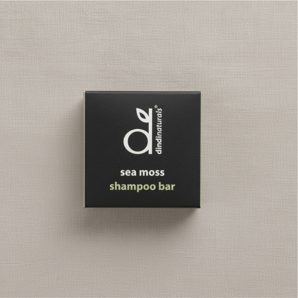 Box of Dindi Naturals sea moss shampoo bar on a beige background
