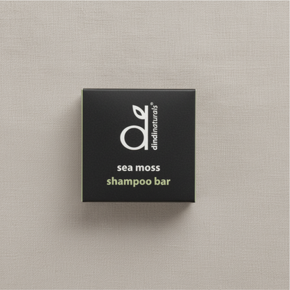 Box of Dindi Naturals sea moss shampoo bar on a beige background