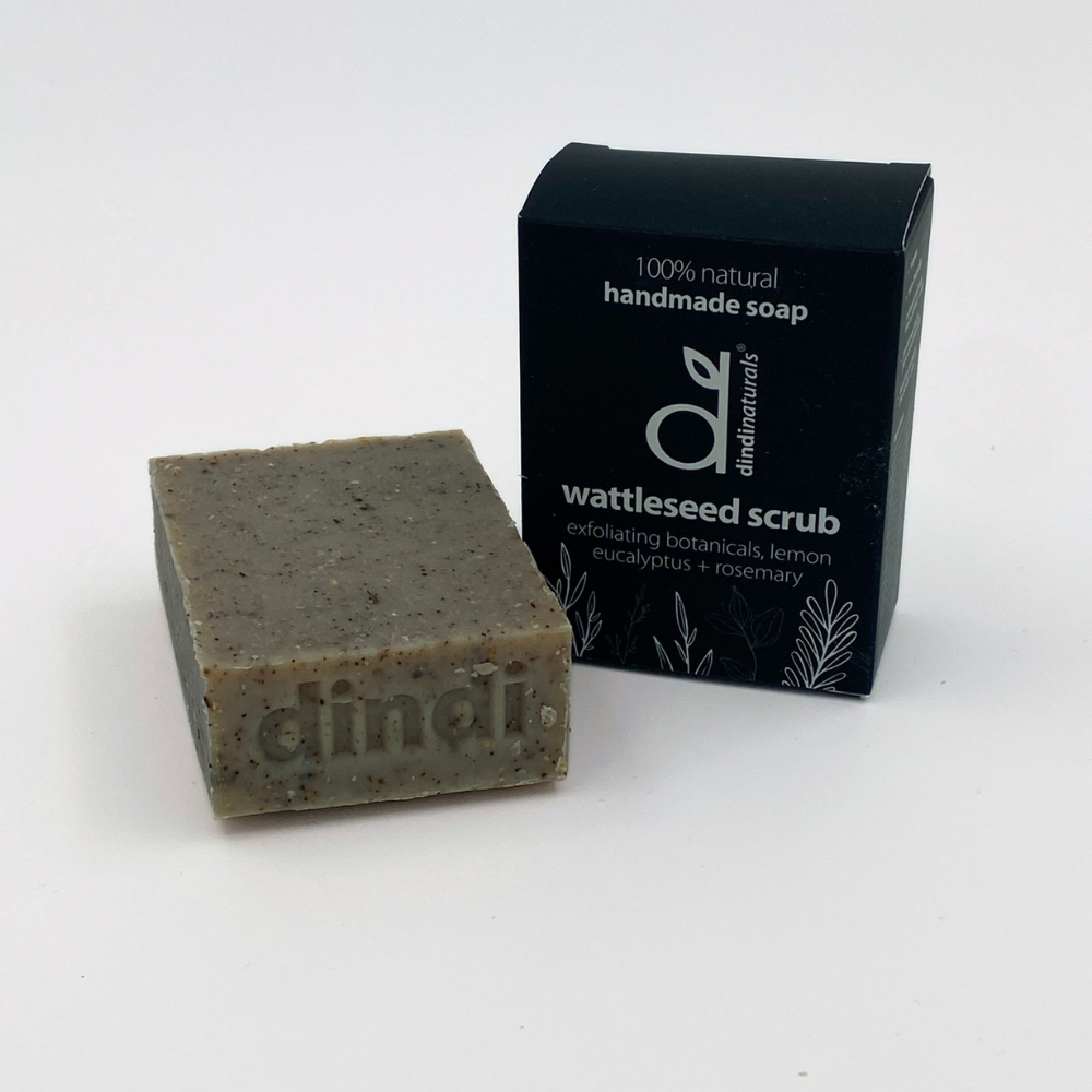 Wattleseed scrub soap bar with black packaging on a white background