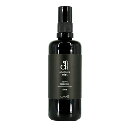 Black bottle of Dindi Naturals organic rose water face mist on a white background