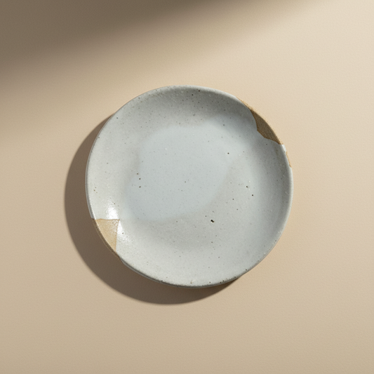 Ceramic bowl on a beige background