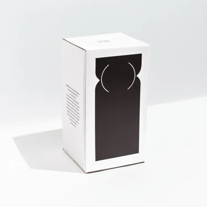 White packaging with a black silhouette of a vase on a white background