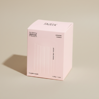Pink box holding a Fazeek Wave Candle with Vetiver and Pink Pepper scent on a beige background