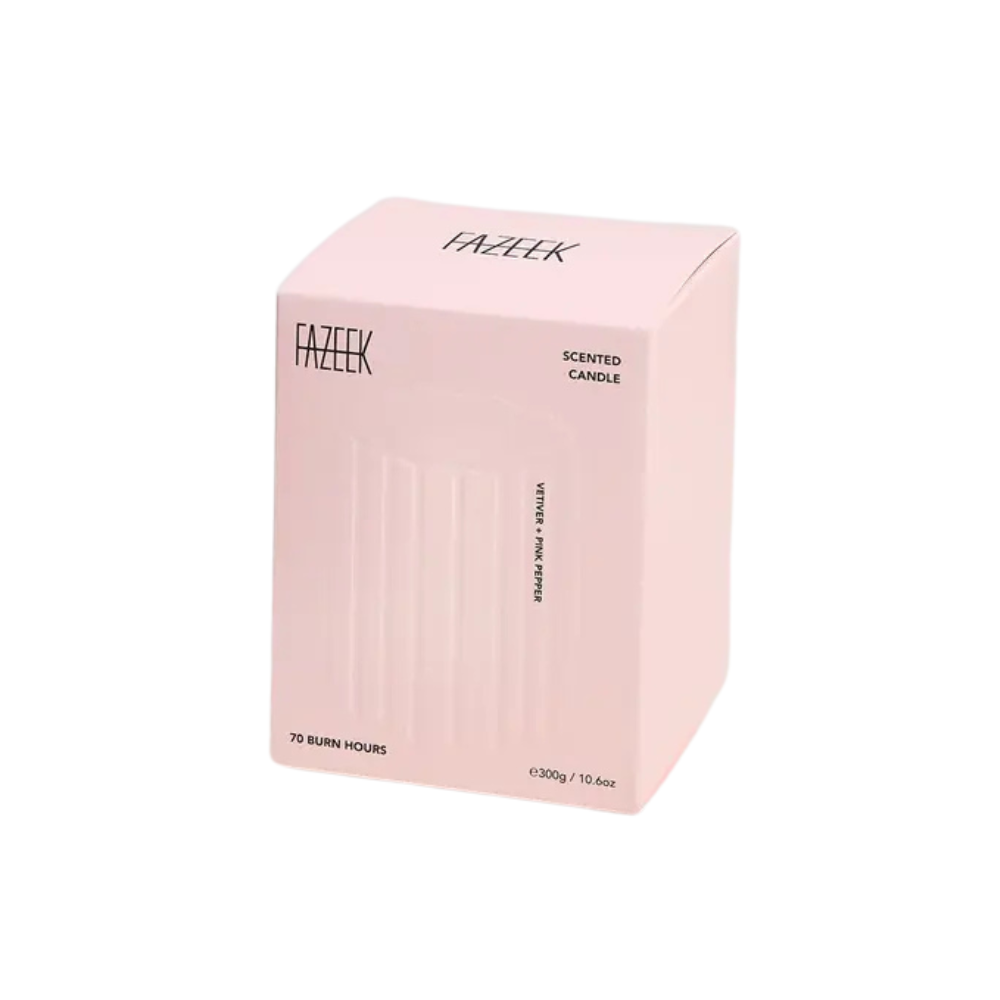 Pink box holding a Fazeek Wave Candle with Vetiver and Pink Pepper scent on a white background