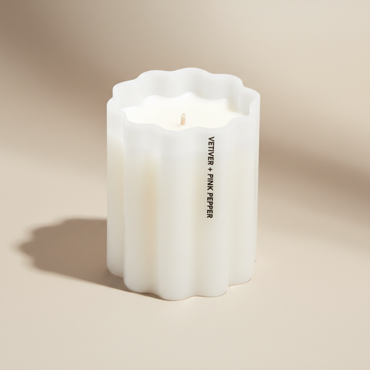 Fazeek Wave Candle with Vetiver and Pink Pepper scent on a beige background