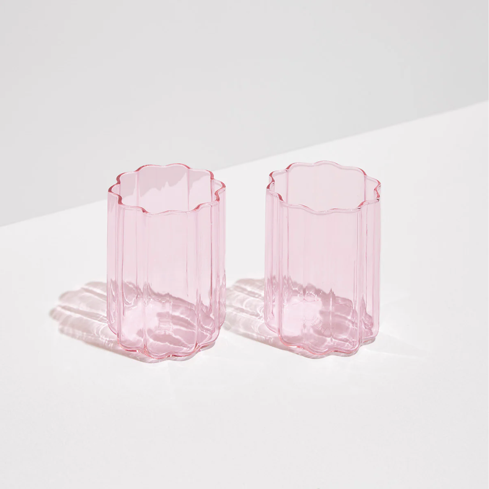 Two pink Fazeek wave glasses on a light background