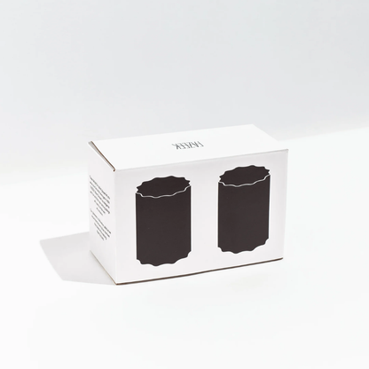 White packaging with silhouette of two Fazeek wave glasses on a light background