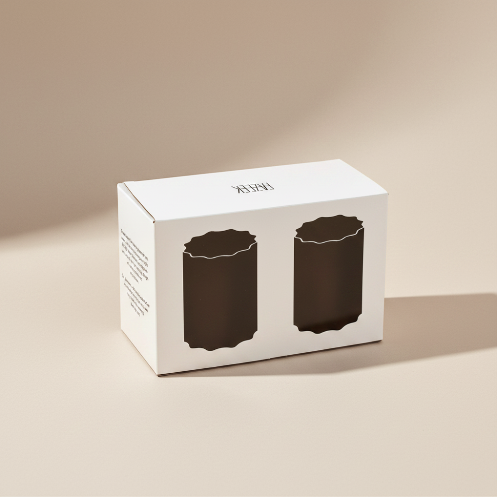 White packaging with silhouette of two Fazeek wave glasses on a light background