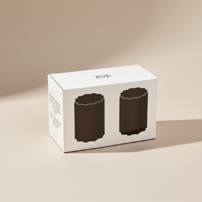 White packaging with silhouette of two Fazeek wave glasses on a light background