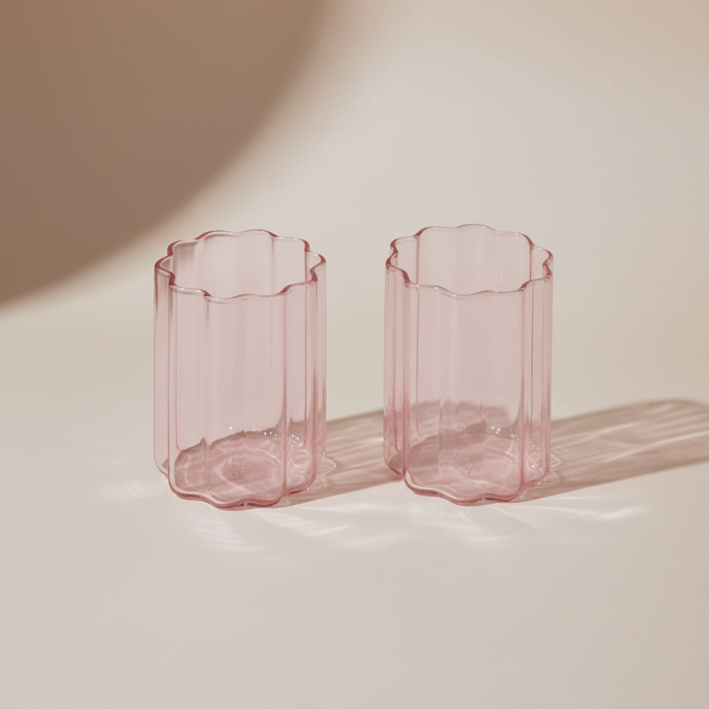 Two pink Fazeek wave glasses on a light background