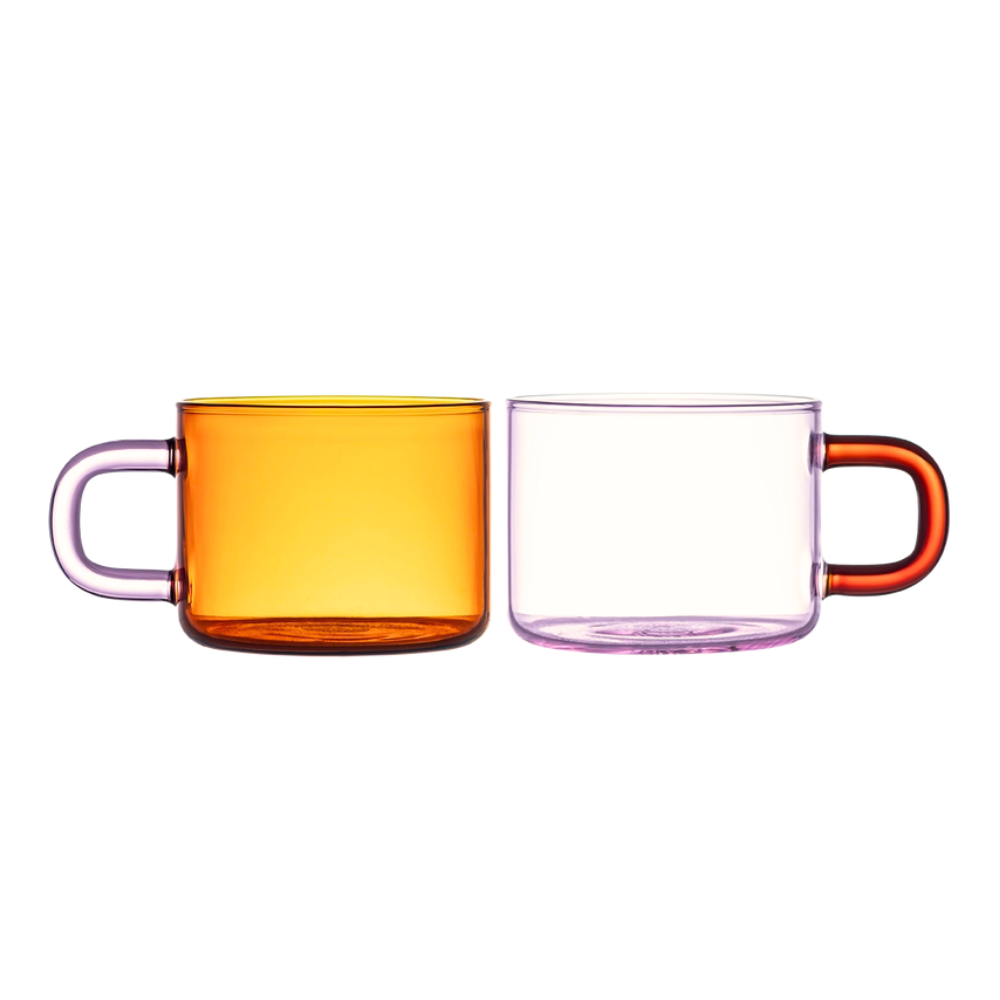 Two colourful glass mugs on a white background