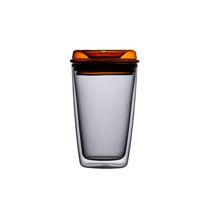 Grey glass cup with orange lid. Can be used for tea, coffee or other beverages
