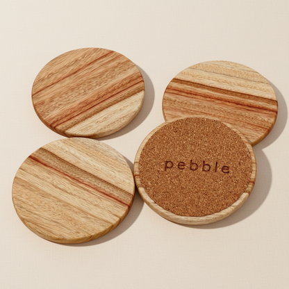 Wooden coasters with cork base on a beige background