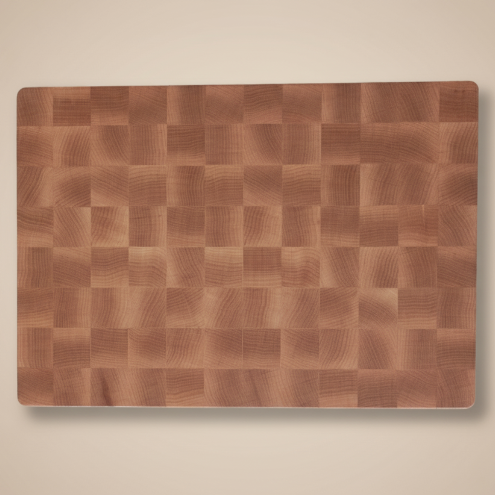 Wooden cutting board on a beige background