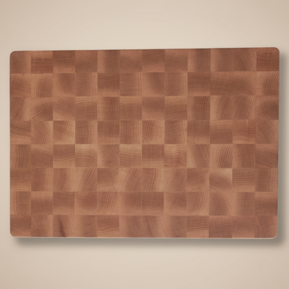 Wooden cutting board on a beige background