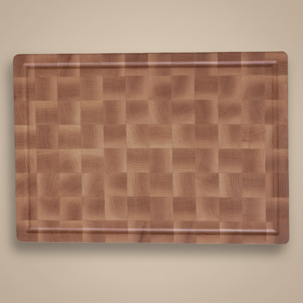 Wooden cutting board on a beige background