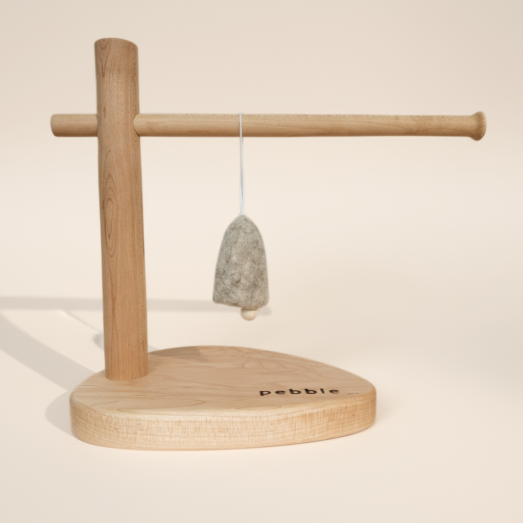 Earthy marbled beige felt bell ornament with white clapper and cotton hanging string- Pebble Studio festive decor