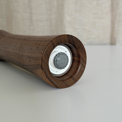 Pebble Studio handcrafted Walnut salt & pepper mill in Large size featuring a premium Crushgrind mechanism.