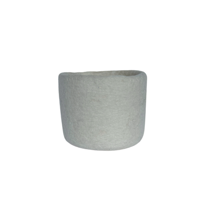Loft Wool Felt Extra Small Basket  in Snow- natural white wool felt catchall basket on a light background