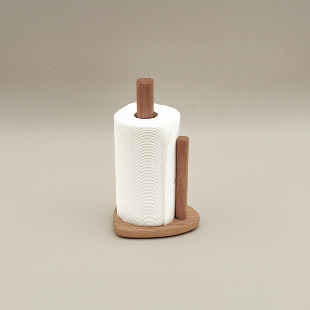 Wooden paper towel holder with a roll of white paper towels on a beige background