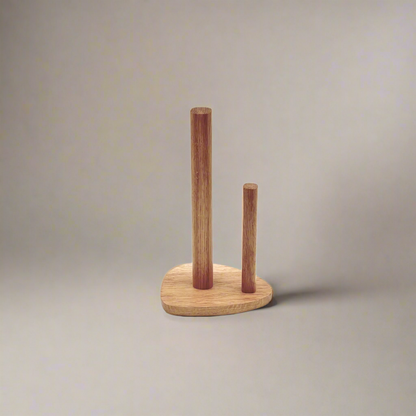 Wooden paper towel holder on a plain background