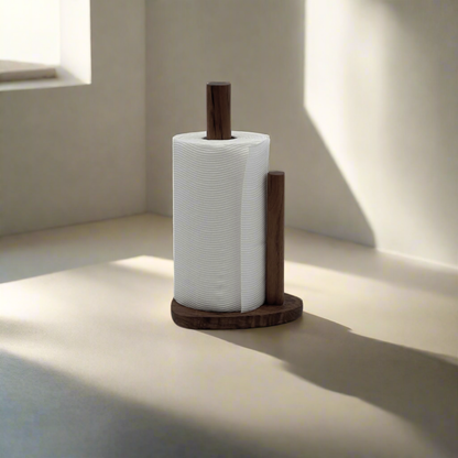 Wooden paper towel holder with a roll of white paper towels on a light surface.