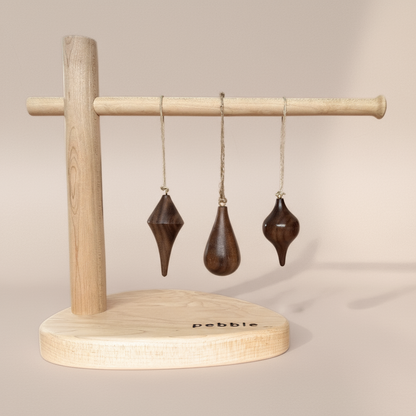 Hand turned Christmas ornaments in Walnut. Made in Australia for slow living.