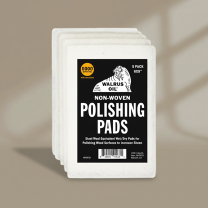 Pack of Walrus Oil non-woven polishing pads on a beige background
