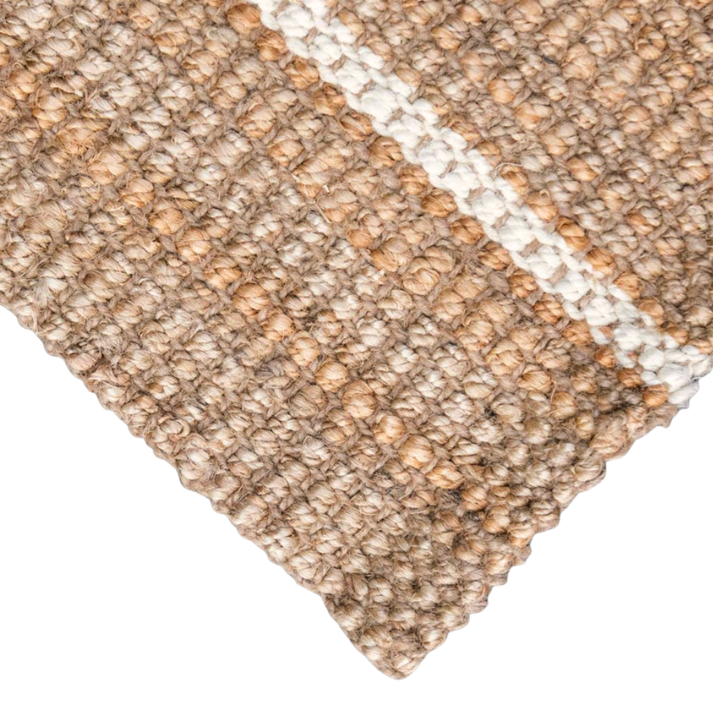 Close-up of a textured beige mat corner
